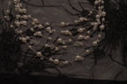 Multi-strand floating pearl illusion necklace