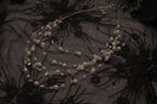 Multi-strand floating pearl illusion necklace