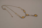 Vintage Avon silver-toned "Goddess" teardrop lariat Y-drop necklace