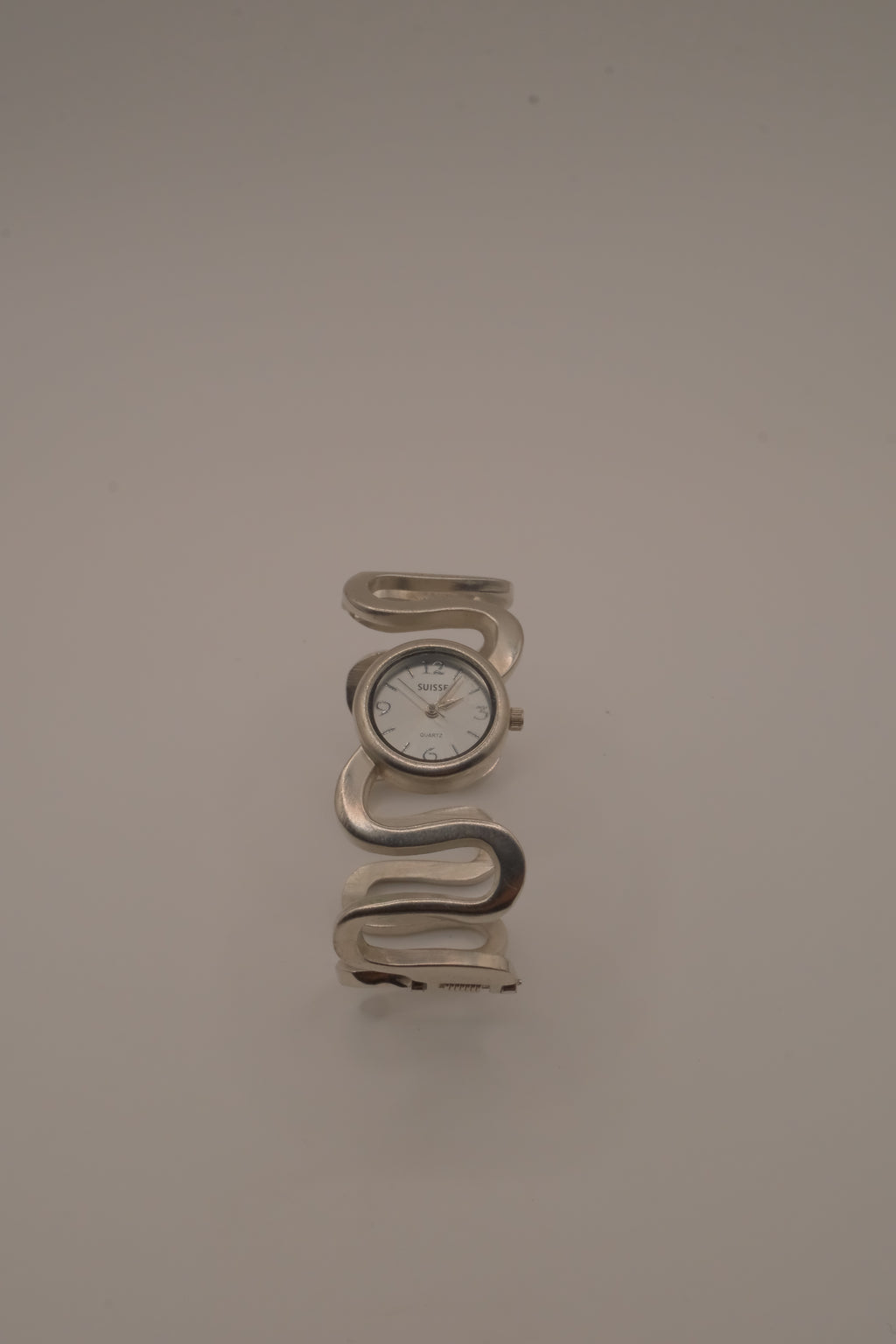 Vintage Suisse silver-tone quartz bangle watch
