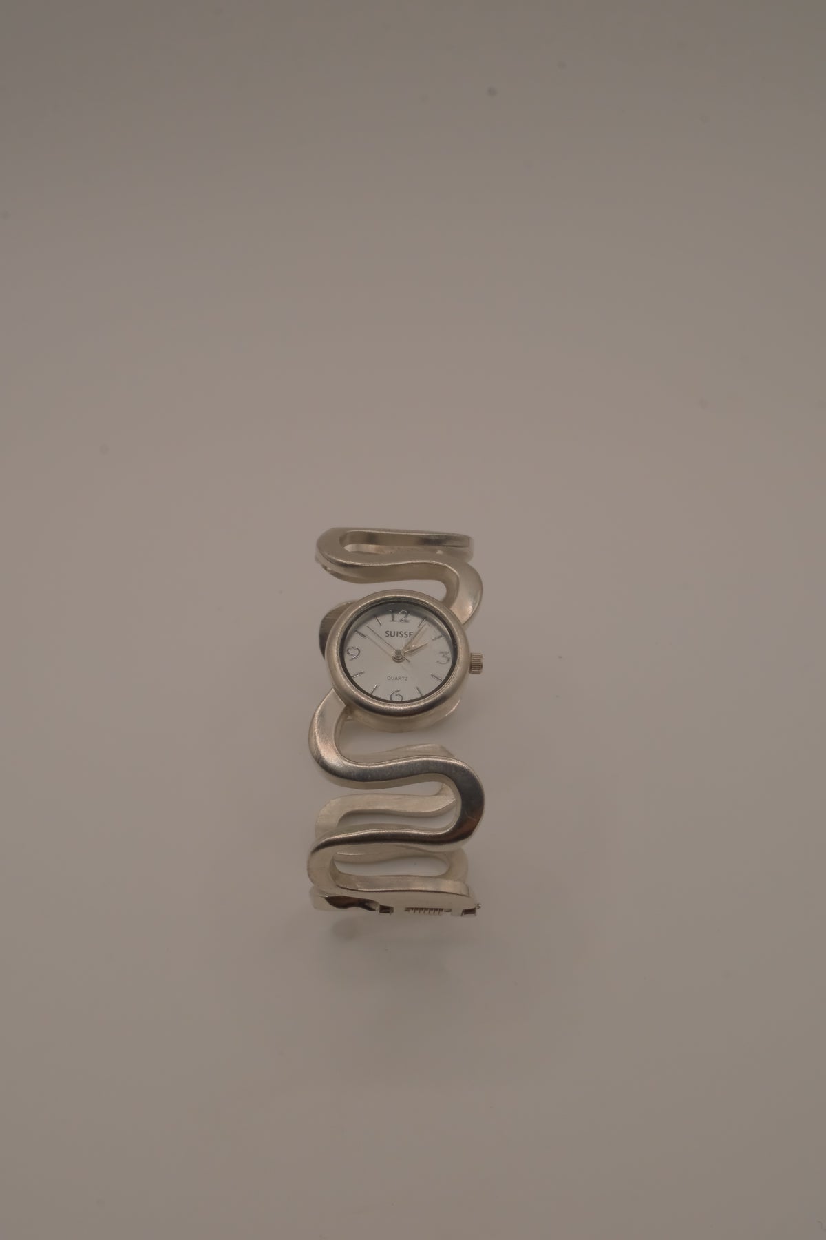 Vintage Suisse silver-tone quartz bangle watch