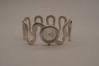 Vintage Suisse silver-tone quartz bangle watch
