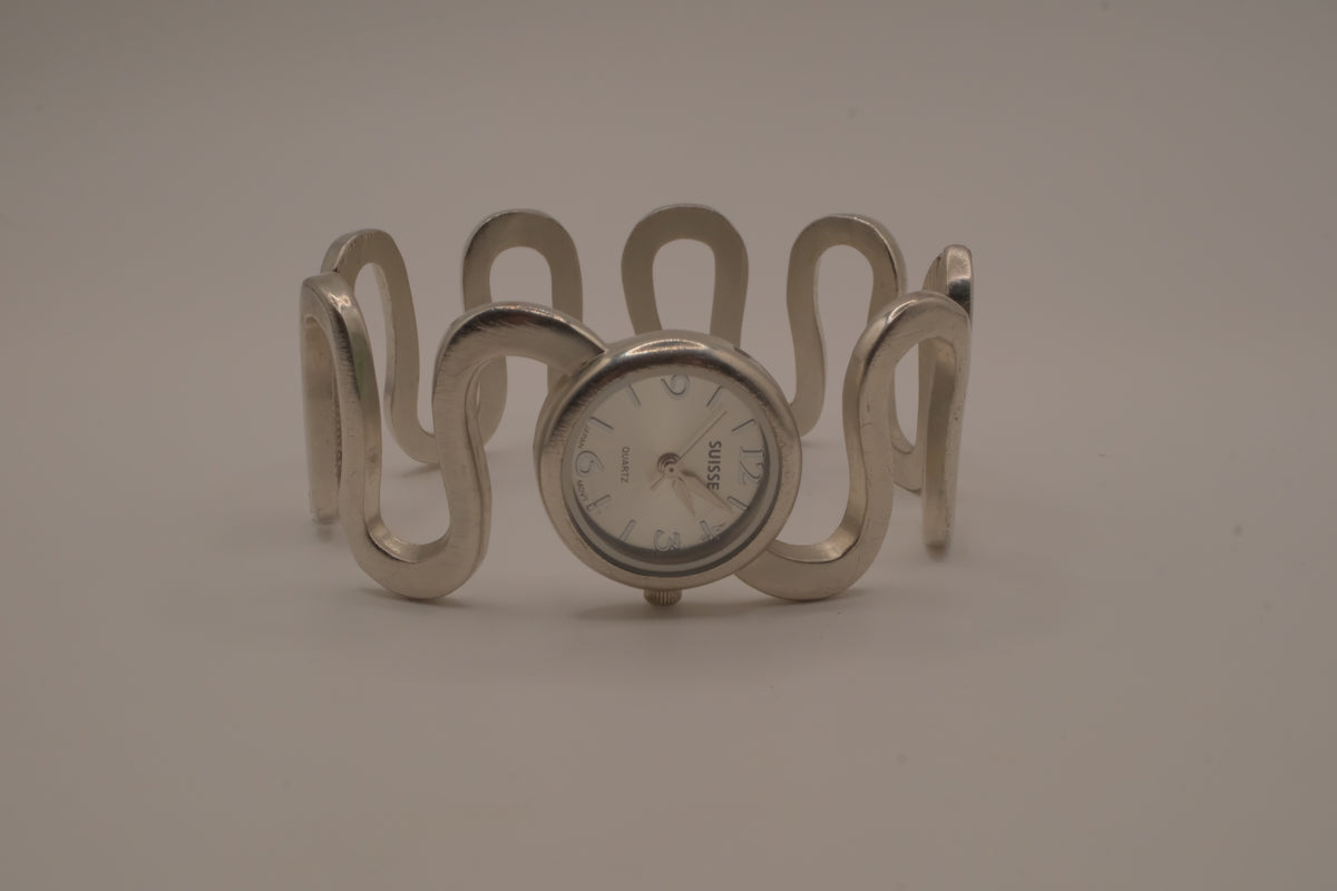 Vintage Suisse silver-tone quartz bangle watch