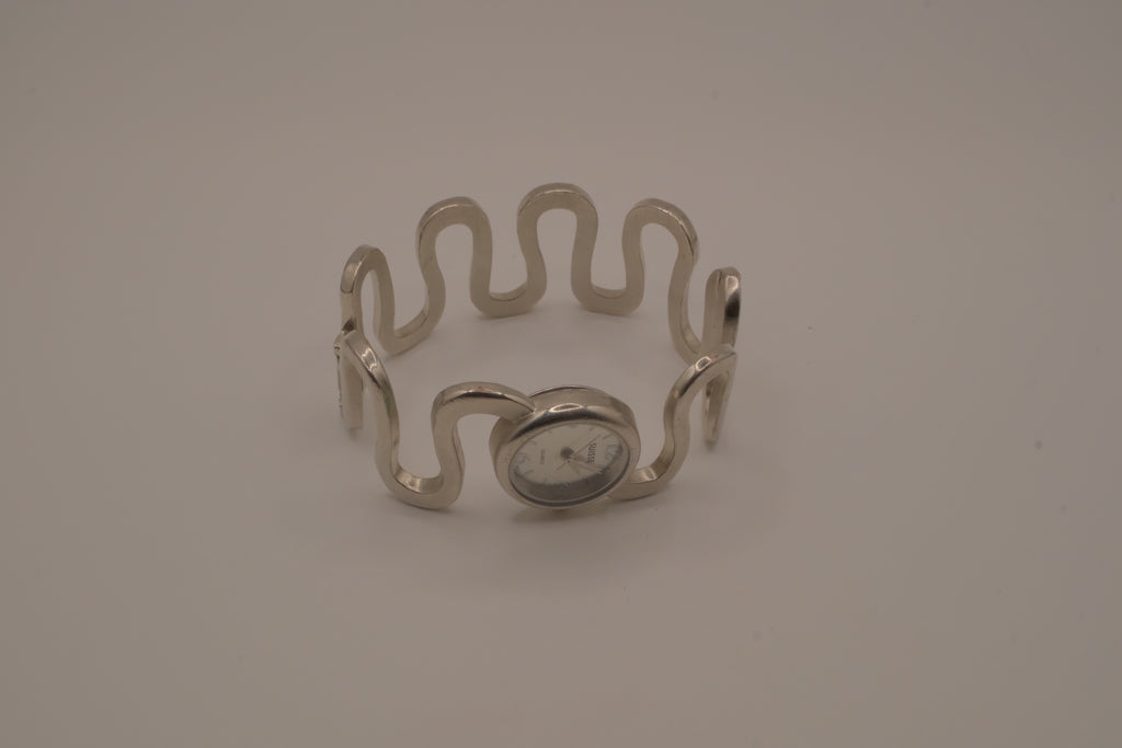 Vintage Suisse silver-tone quartz bangle watch