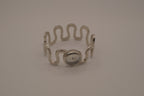 Vintage Suisse silver-tone quartz bangle watch