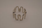 Vintage Suisse silver-tone quartz bangle watch