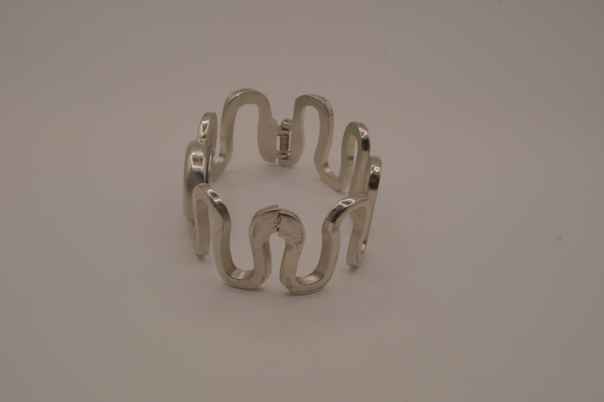 Vintage Suisse silver-tone quartz bangle watch