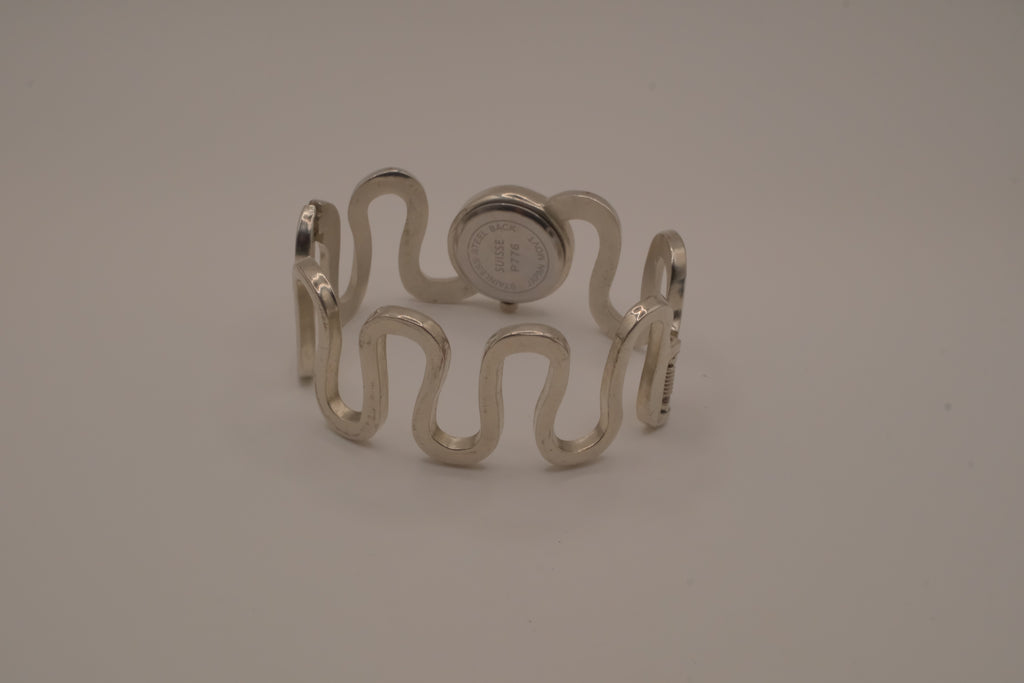 Vintage Suisse silver-tone quartz bangle watch