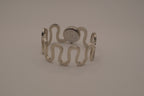 Vintage Suisse silver-tone quartz bangle watch