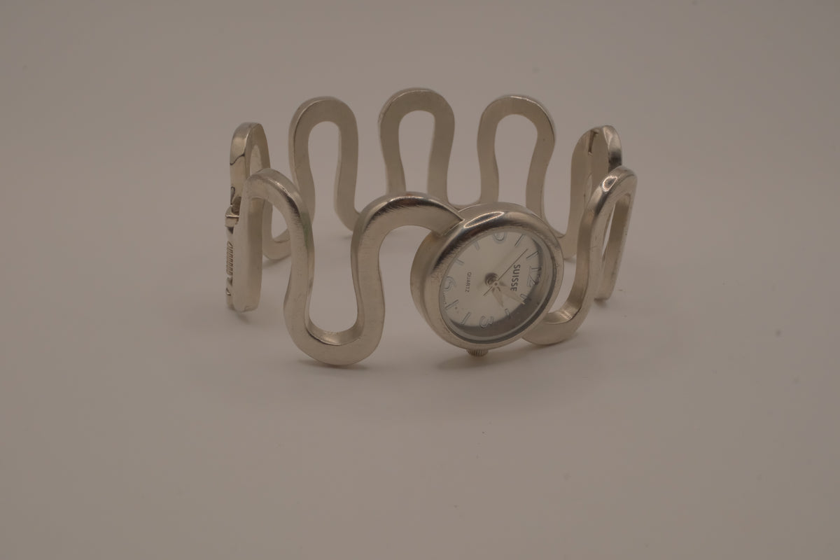 Vintage Suisse silver-tone quartz bangle watch