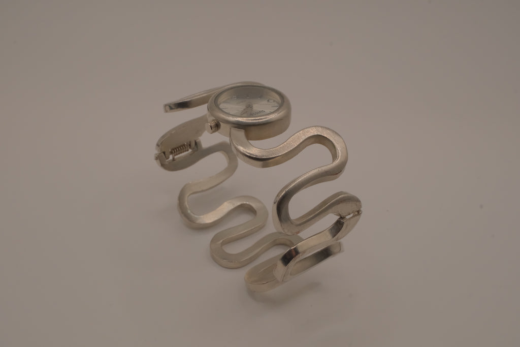 Vintage Suisse silver-tone quartz bangle watch