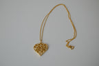 Delicate gold toned openwork heart pendant necklace&nbsp;
