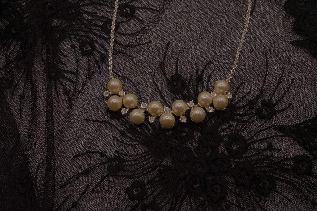 Vintage Avon faux pearl and rhinestone cluster necklace