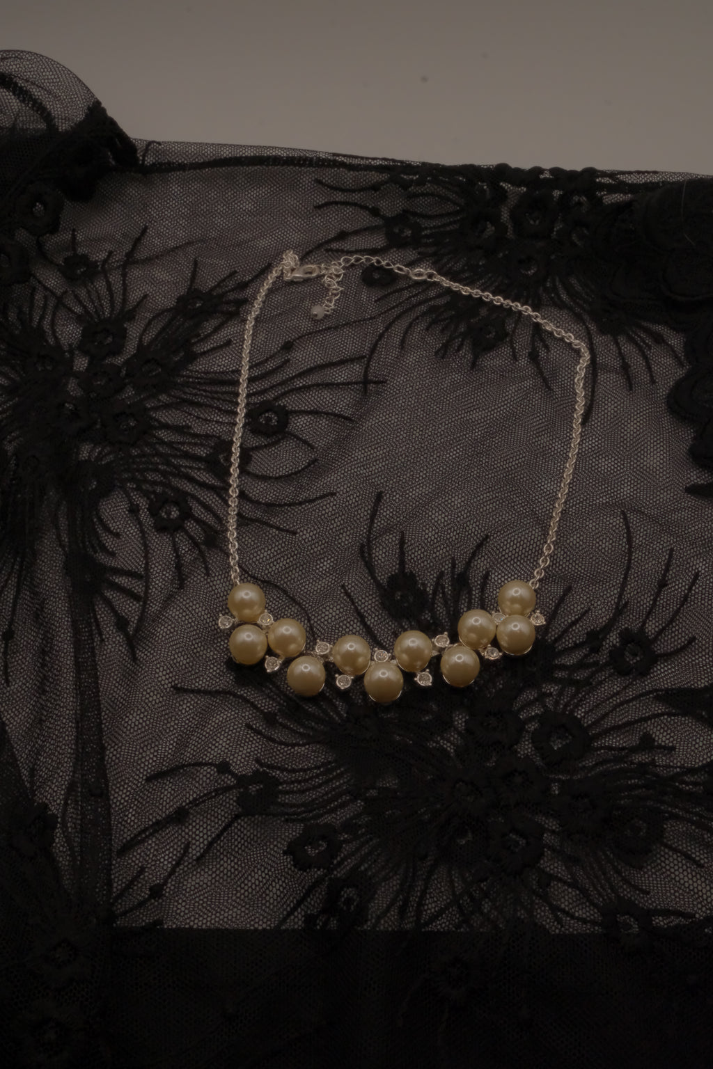 Vintage Avon faux pearl and rhinestone cluster necklace