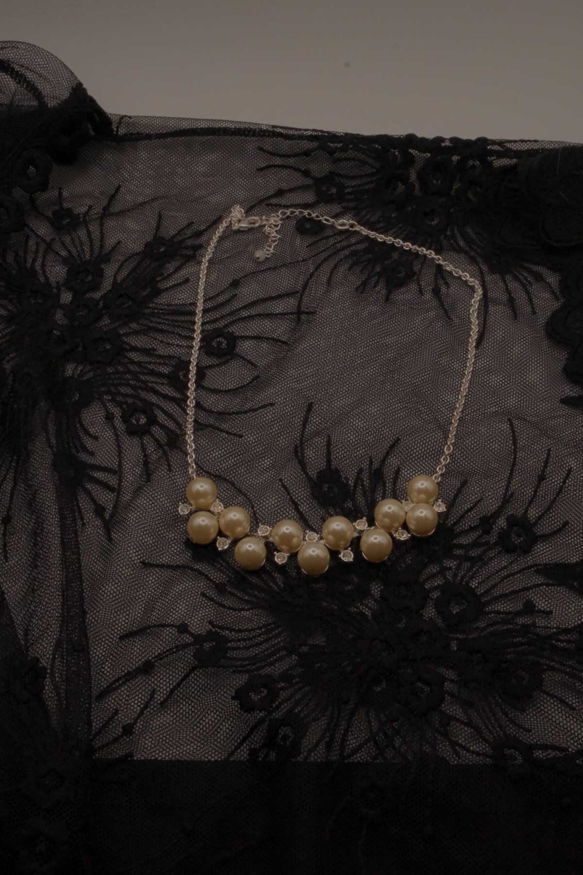 Vintage Avon faux pearl and rhinestone cluster necklace