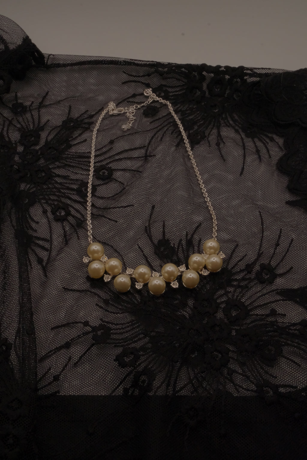 Vintage Avon faux pearl and rhinestone cluster necklace