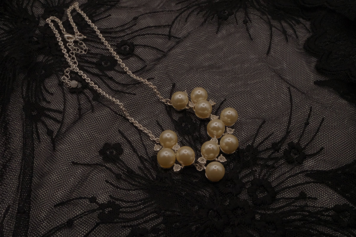Vintage Avon faux pearl and rhinestone cluster necklace