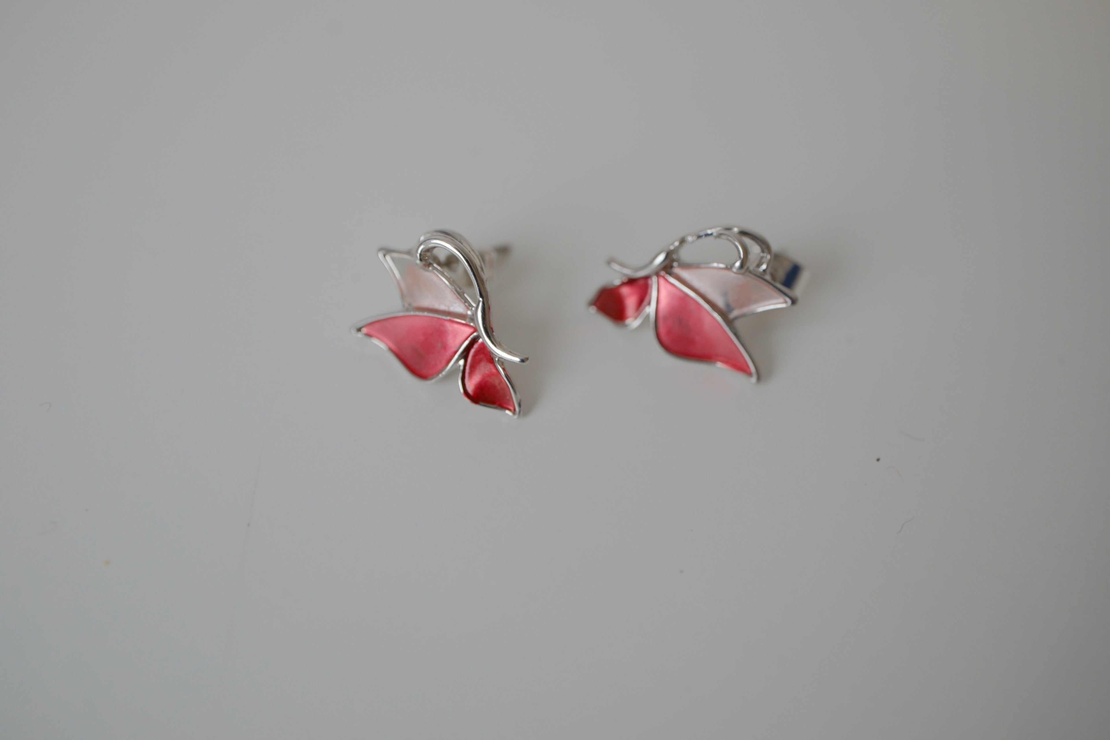 Pink enamel butterfly stud earrings