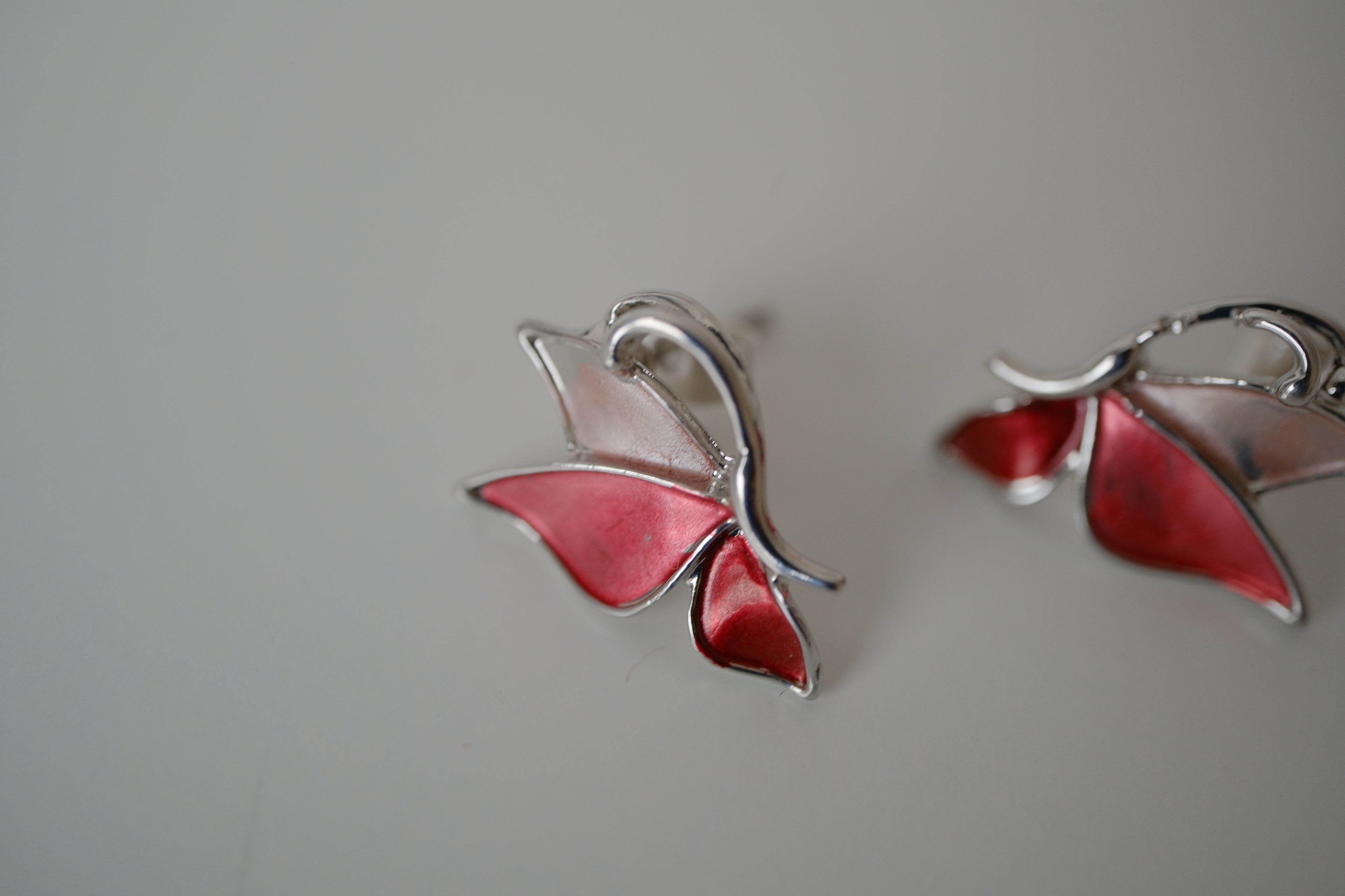 Pink enamel butterfly stud earrings
