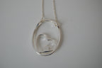 Floating heart pendant necklace