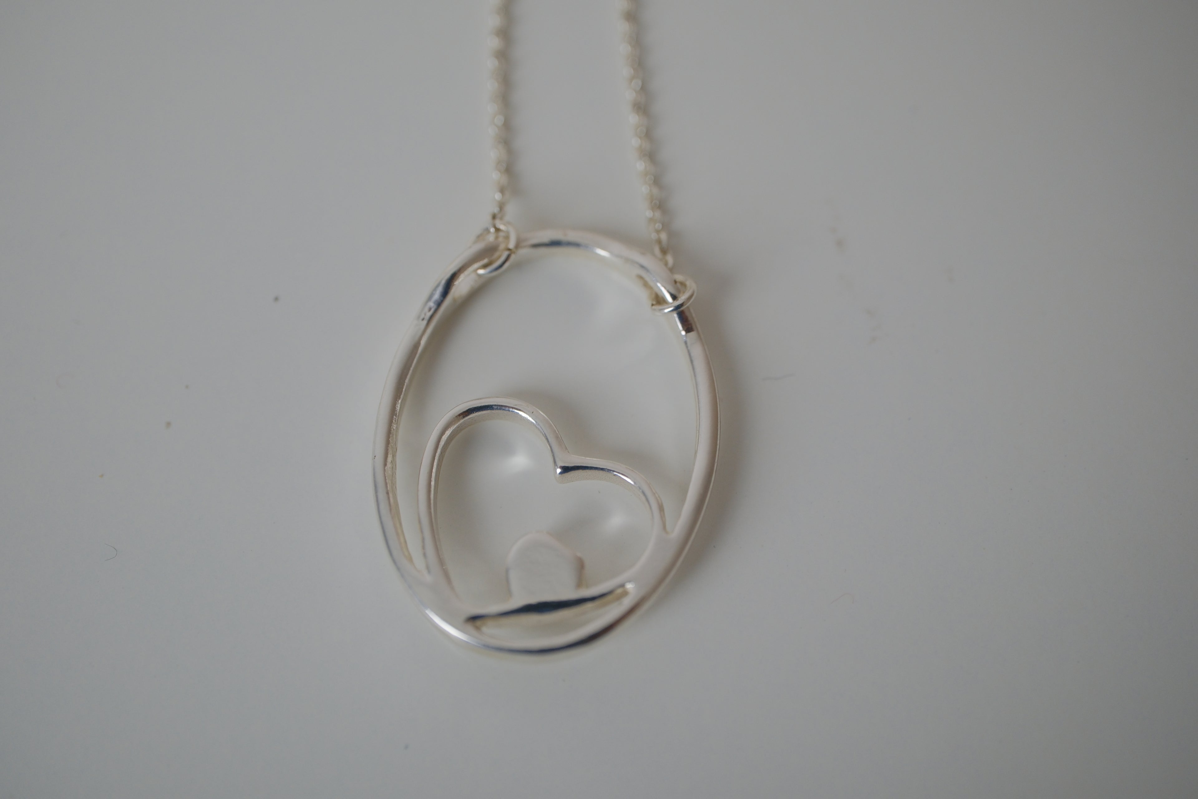 Floating heart pendant necklace