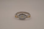 Two-tone filigree expansion watch