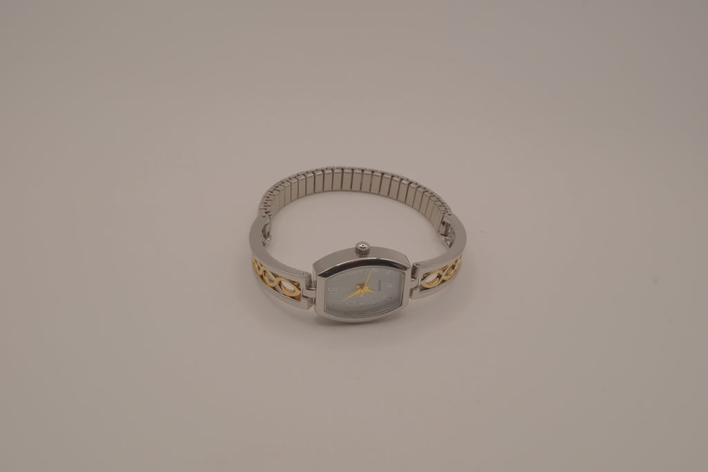Two-tone filigree expansion watch