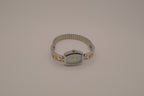 Two-tone filigree expansion watch