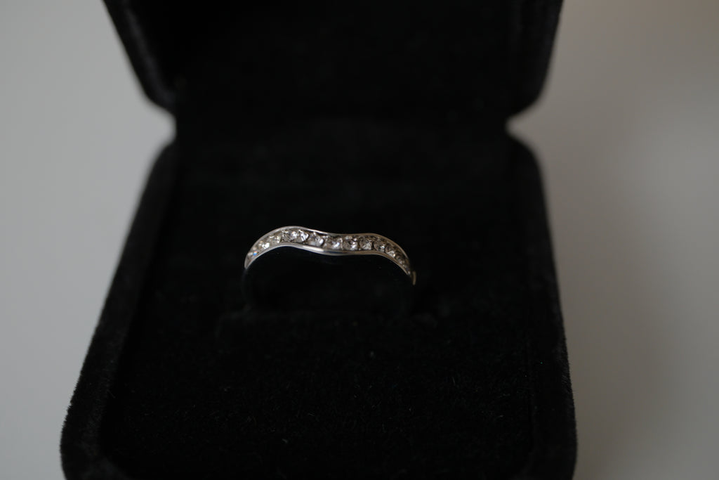 Silver tone white stone curved "wishbone" ring