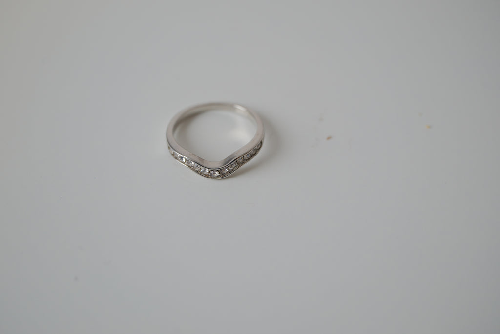 Silver tone white stone curved "wishbone" ring