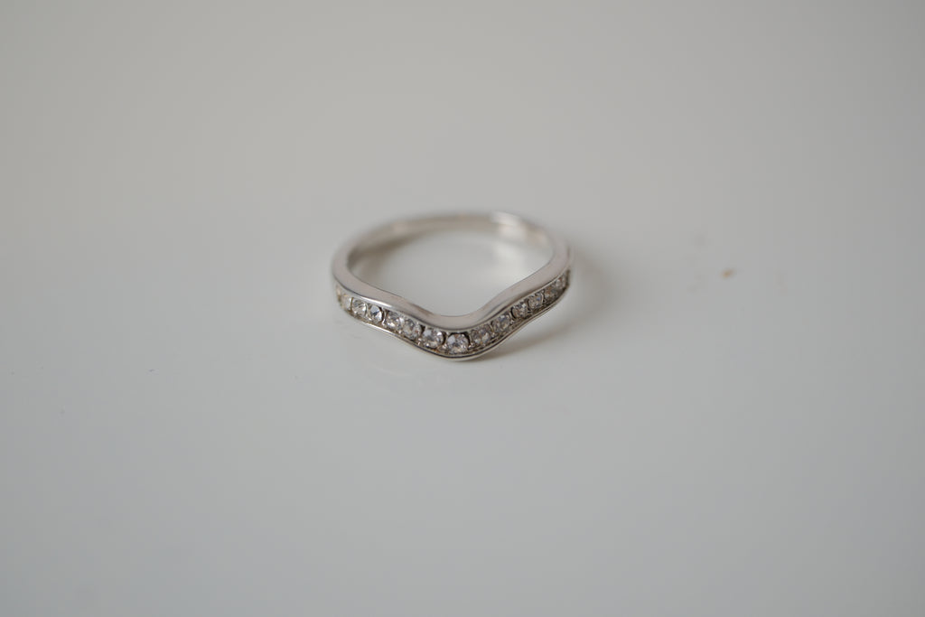 Silver tone white stone curved "wishbone" ring
