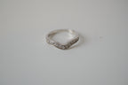 Silver tone white stone curved "wishbone" ring