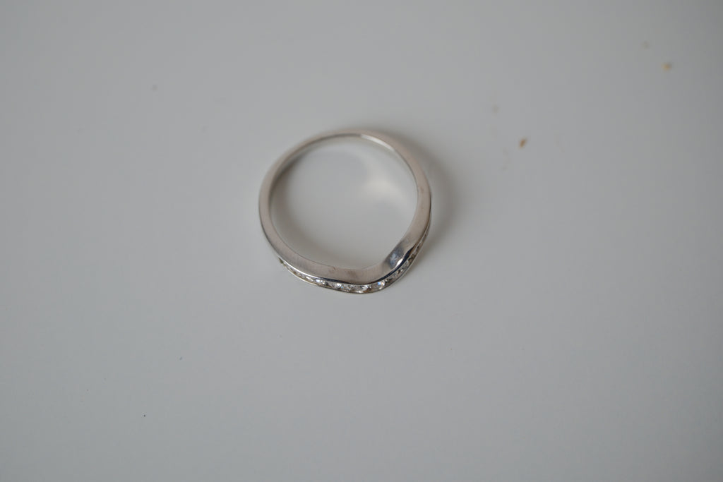 Silver tone white stone curved "wishbone" ring