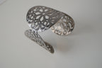 Wide silver cuff bracelet with Floral pattern
