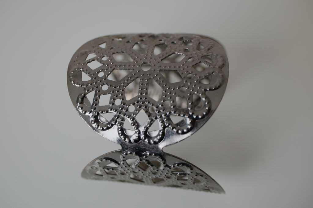 Wide silver cuff bracelet with Floral pattern
