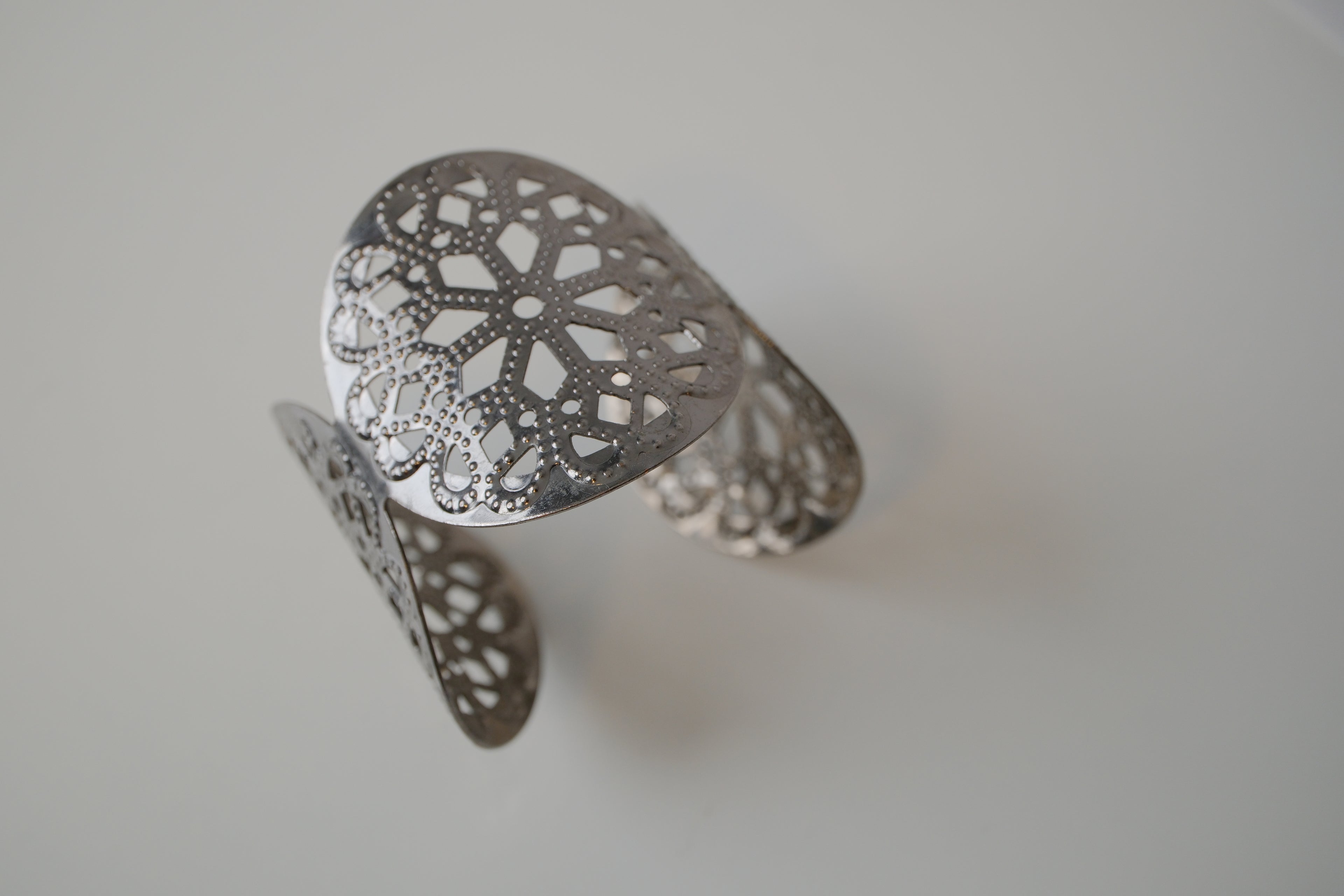 Wide silver cuff bracelet with Floral pattern