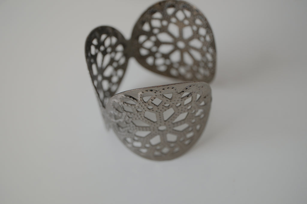 Wide silver cuff bracelet with Floral pattern