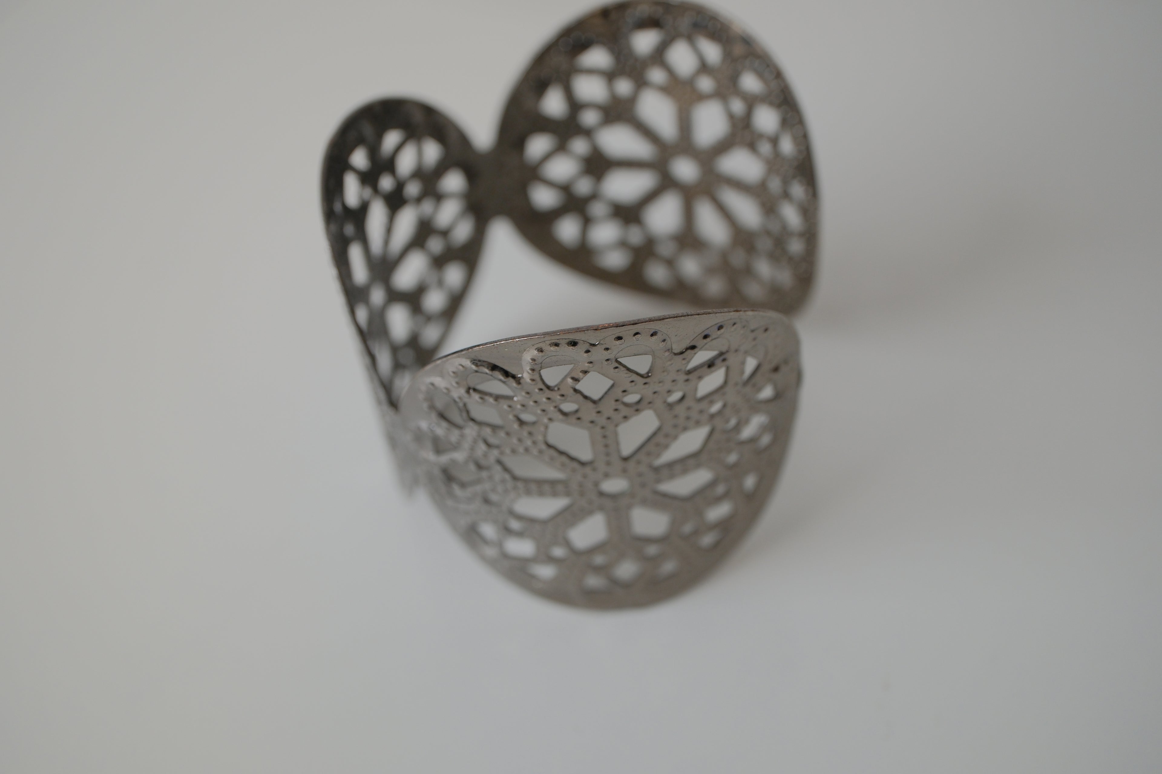 Wide silver cuff bracelet with Floral pattern