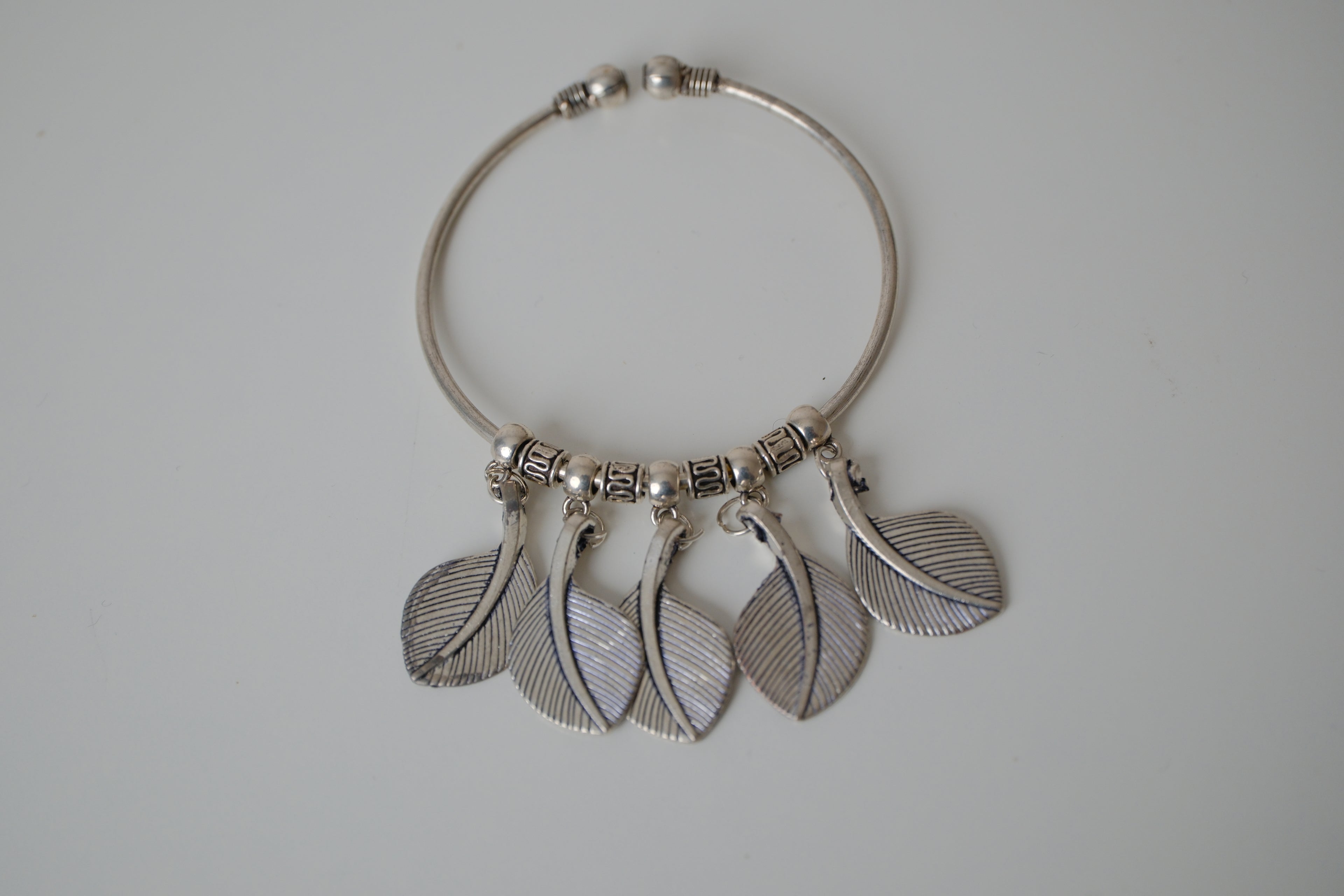 Oxidized leaf charm bangle bracelet