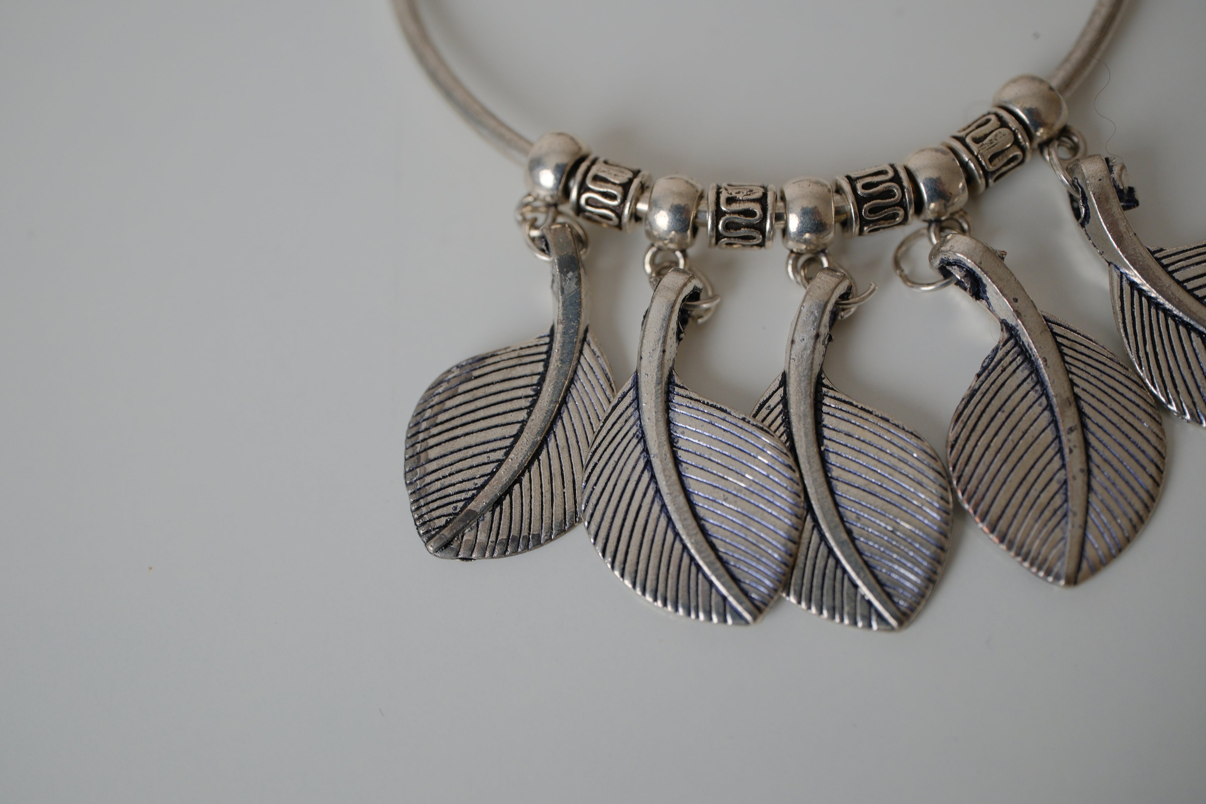 Oxidized leaf charm bangle bracelet