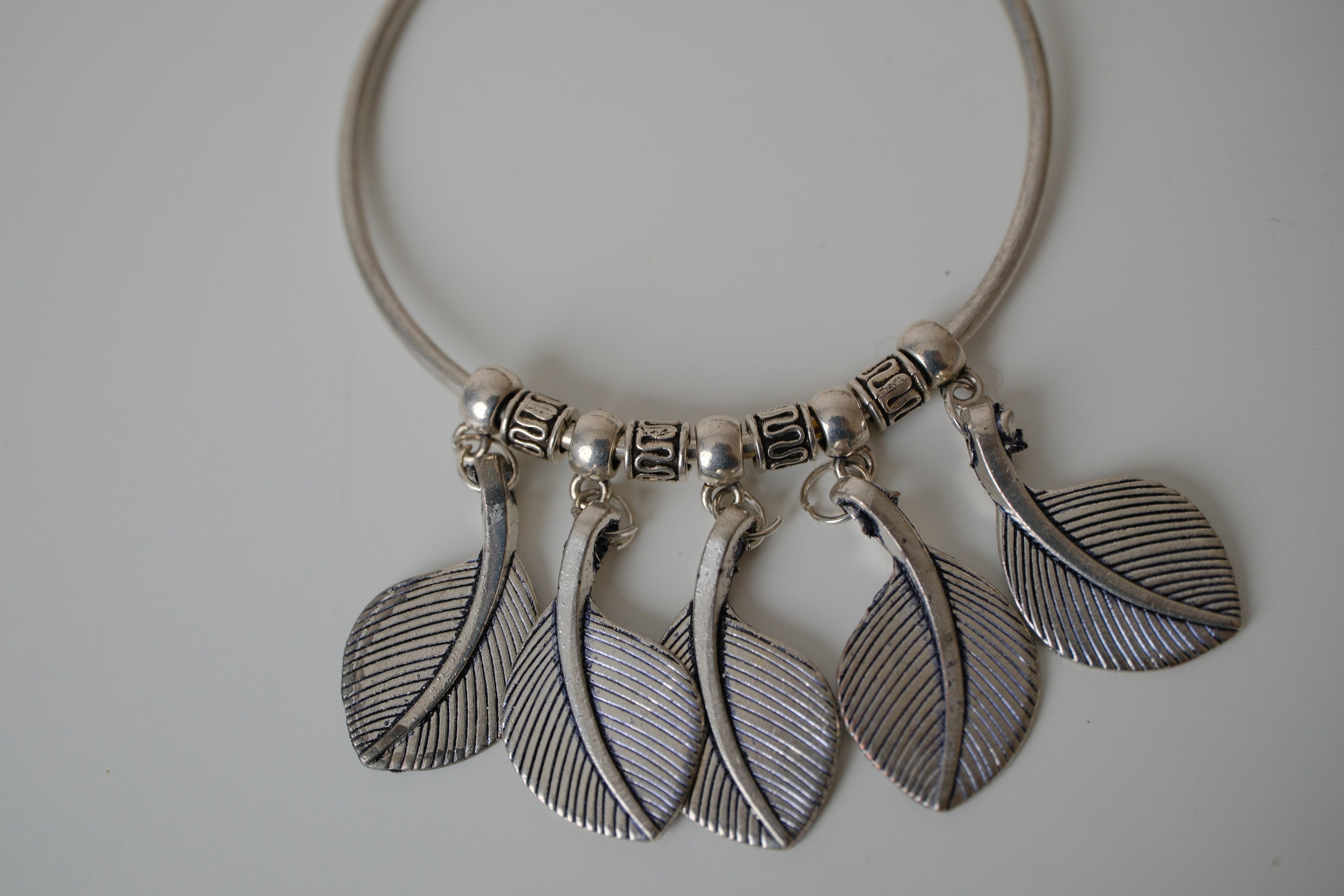 Oxidized leaf charm bangle bracelet