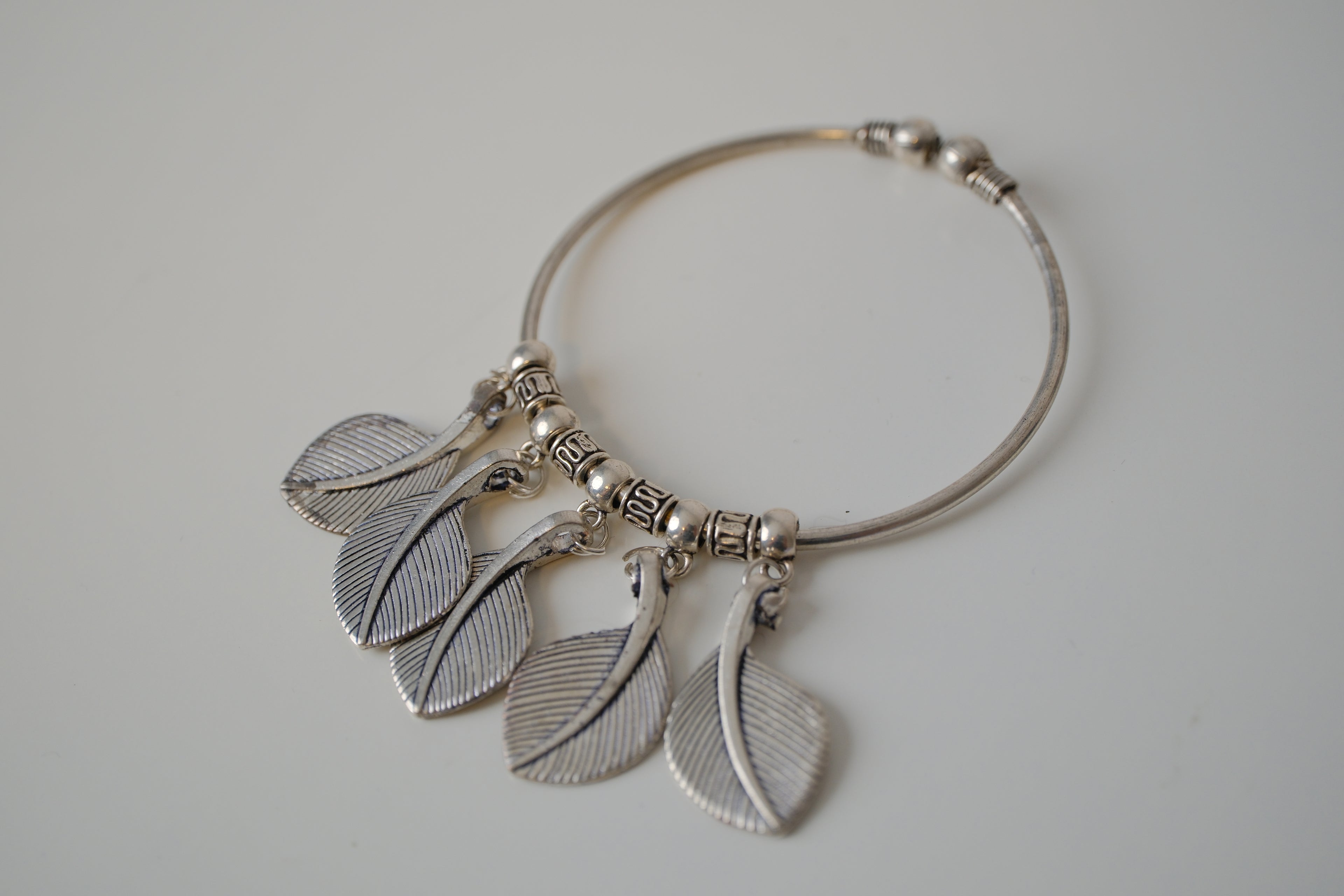 Oxidized leaf charm bangle bracelet