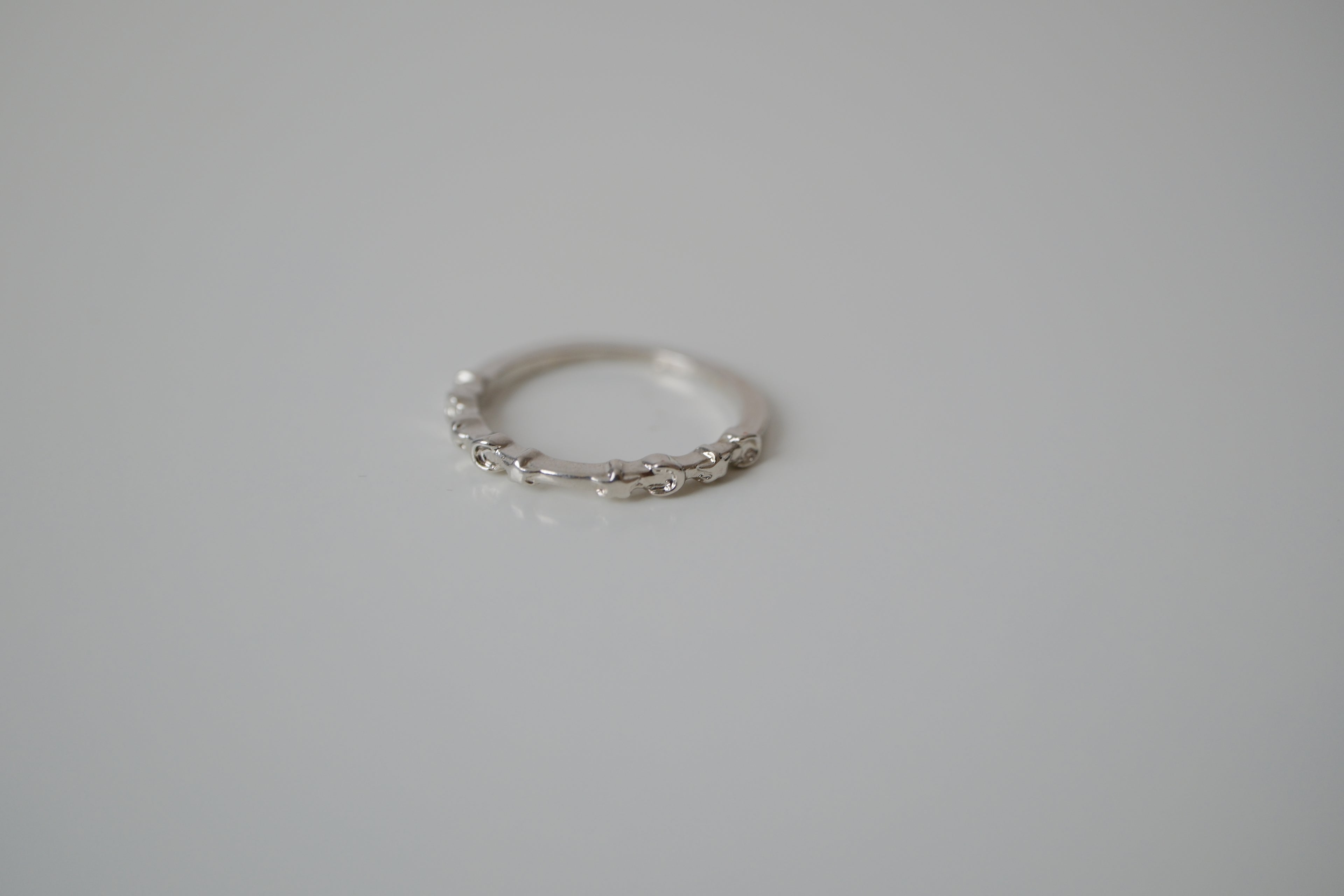 Delicate crescent and star silver tone ring