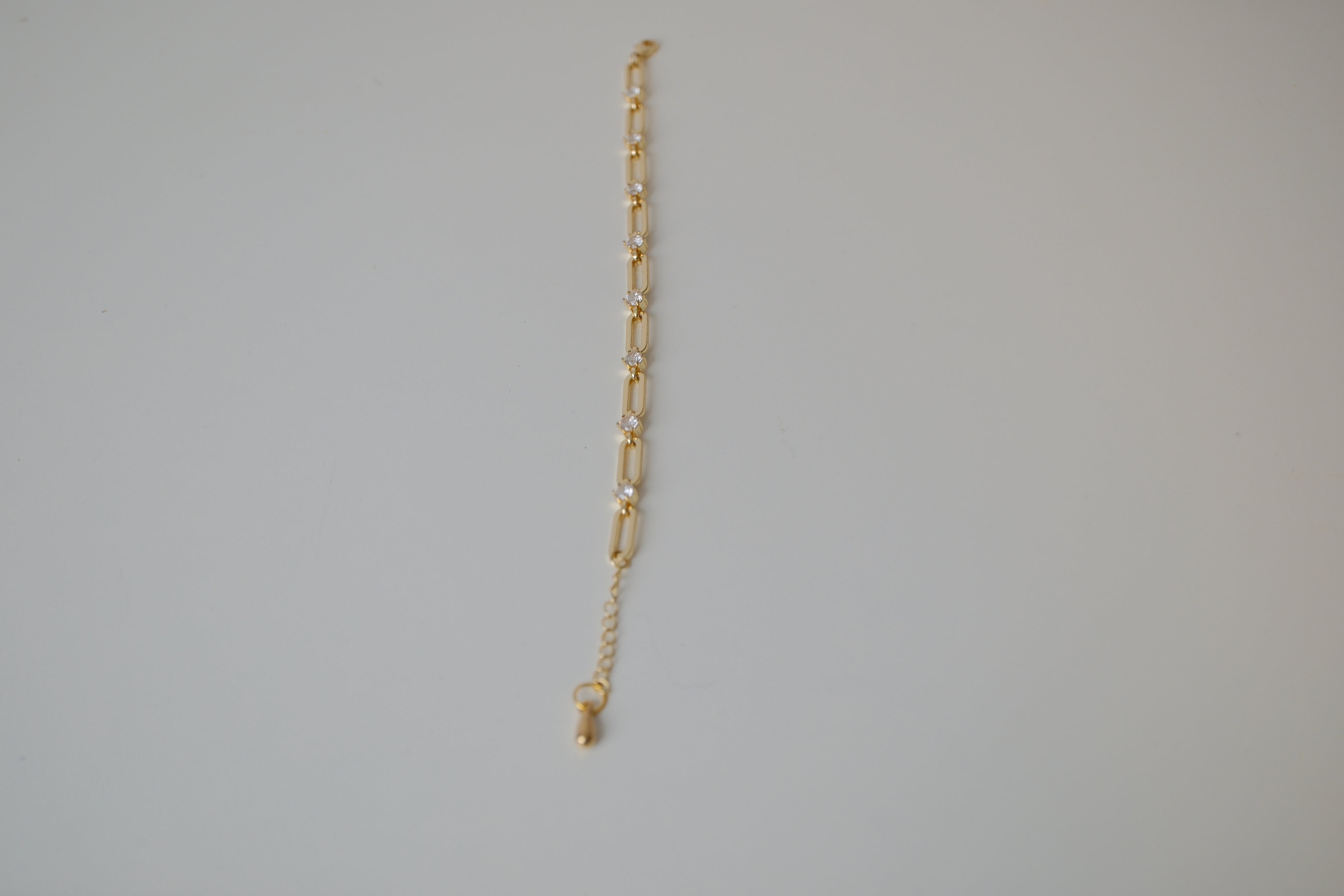 Gold tone paperclip link bracelet