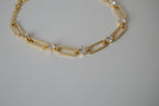 Gold tone paperclip link bracelet