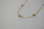 Minimalist beaded station necklace