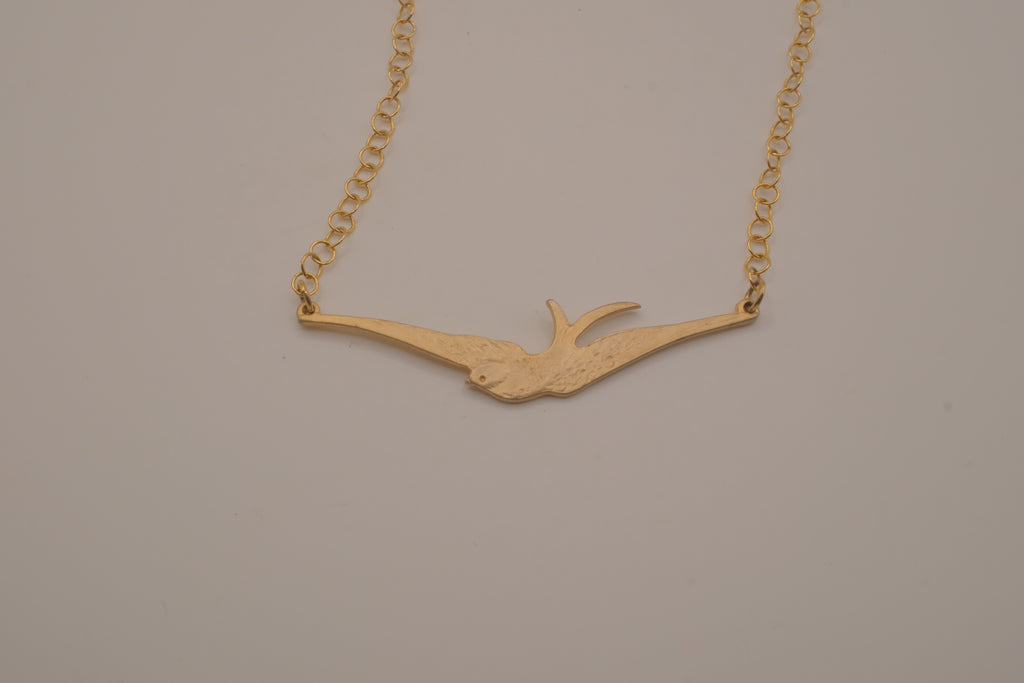 Horizontal flying bird necklace