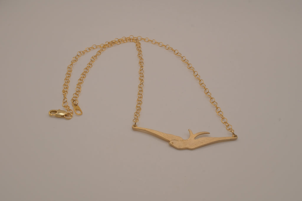 Horizontal flying bird necklace