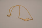 Horizontal flying bird necklace