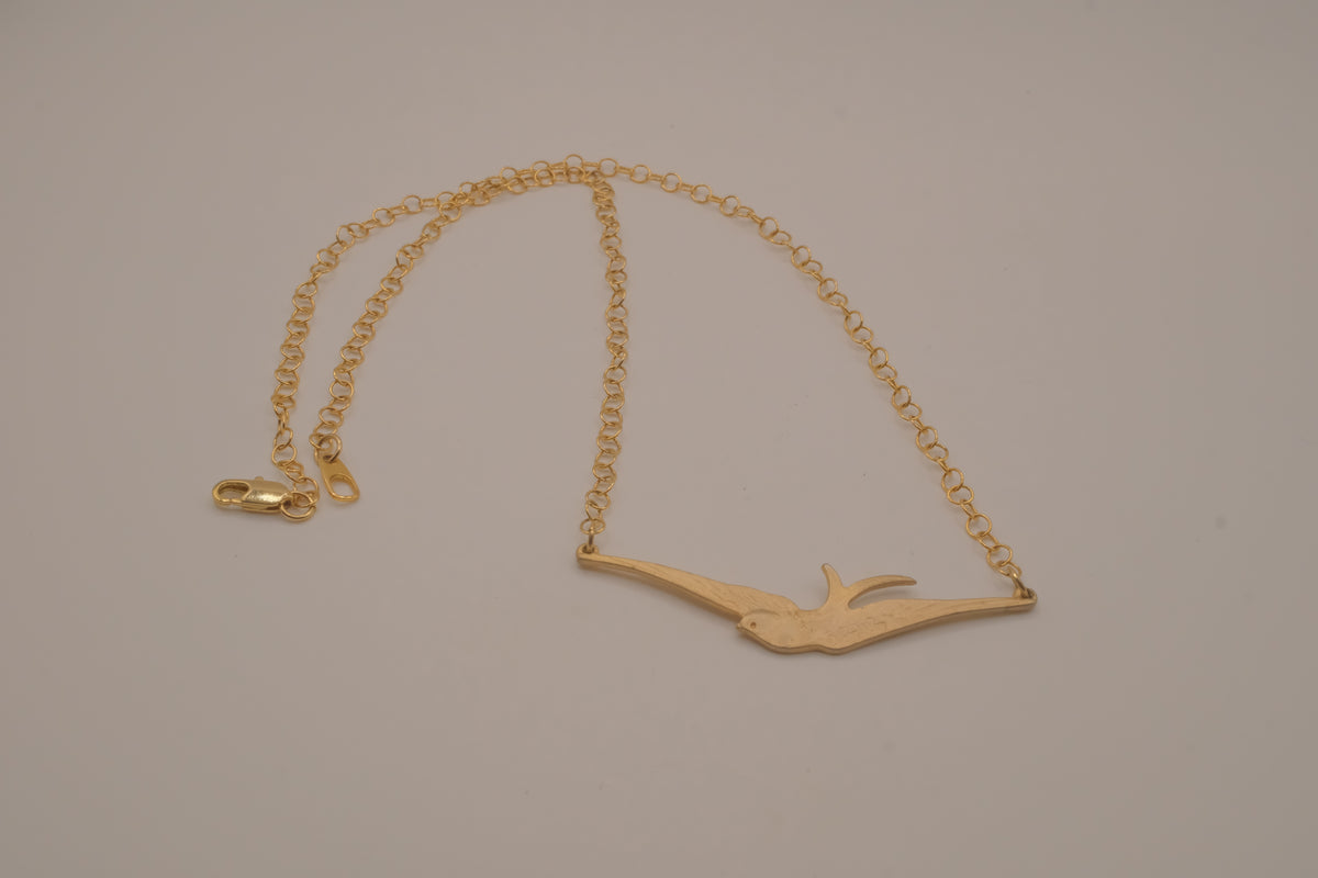 Horizontal flying bird necklace